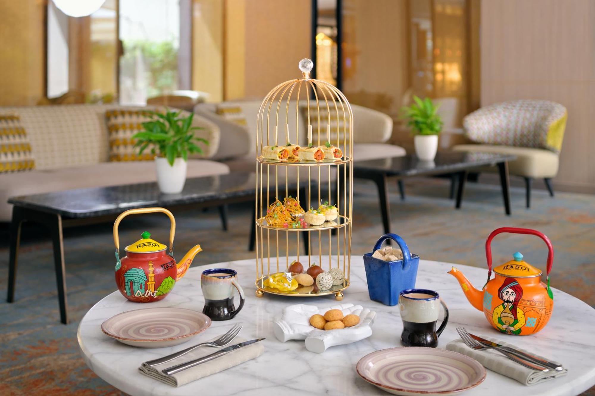 Moevenpick Hotel Tahlia Jeddah Exterior photo Afternoon tea at the hotel